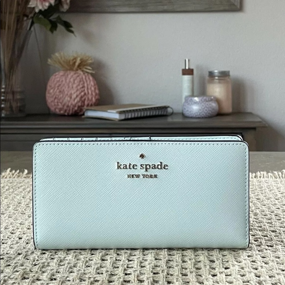 Kate Spade New York Staci Large Slim Bifold Wallet In Crystal Blue /Gold